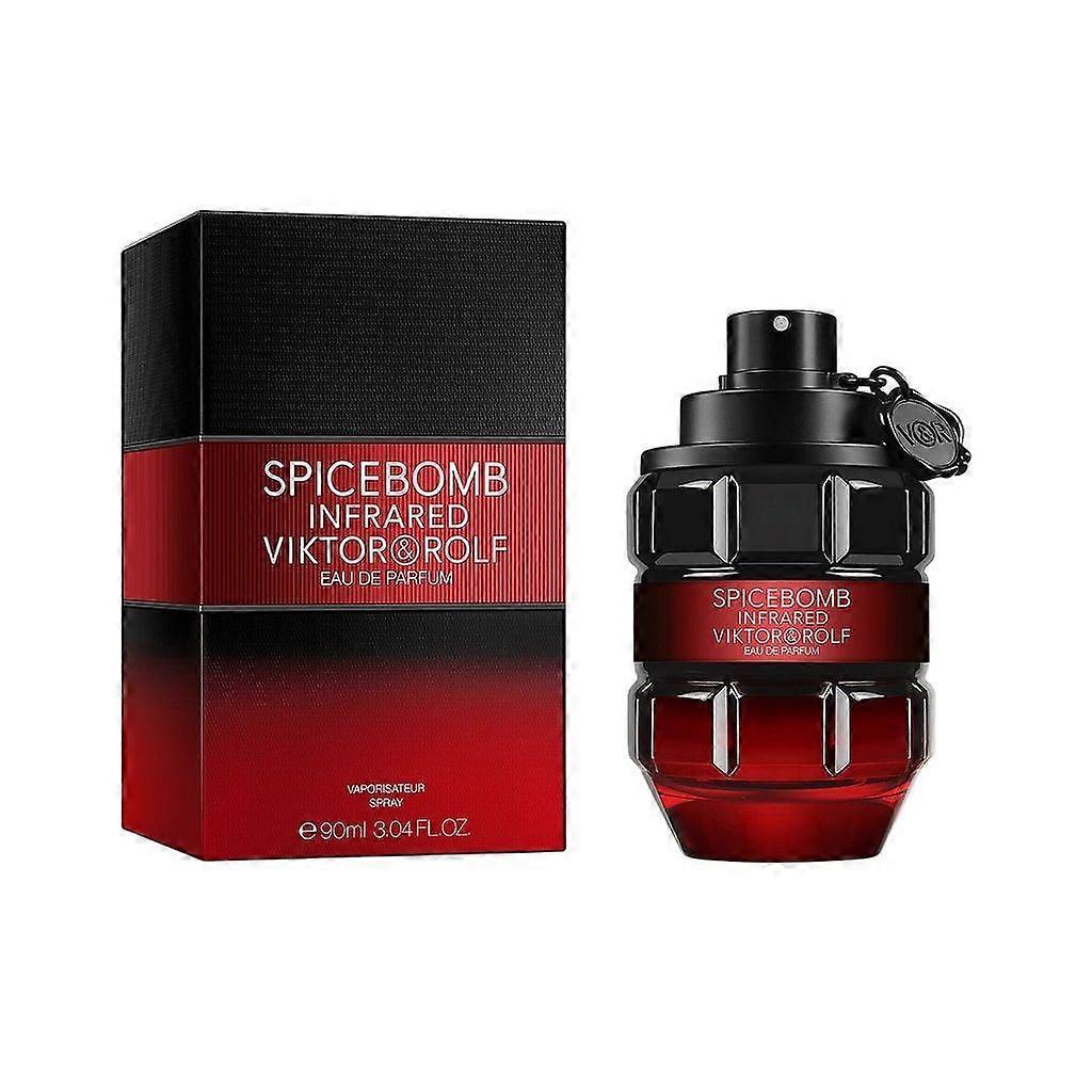 a bottle of perfume next to a box