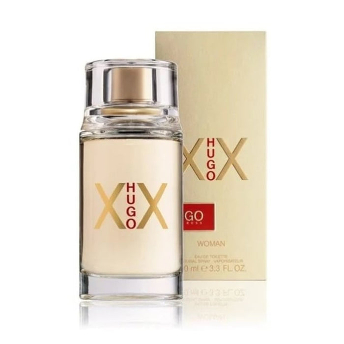 a bottle of perfume next to a box