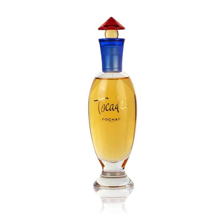 a bottle of perfume on a white background