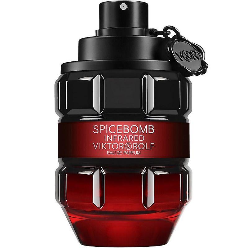 a red and black bottle of perfume on a white background