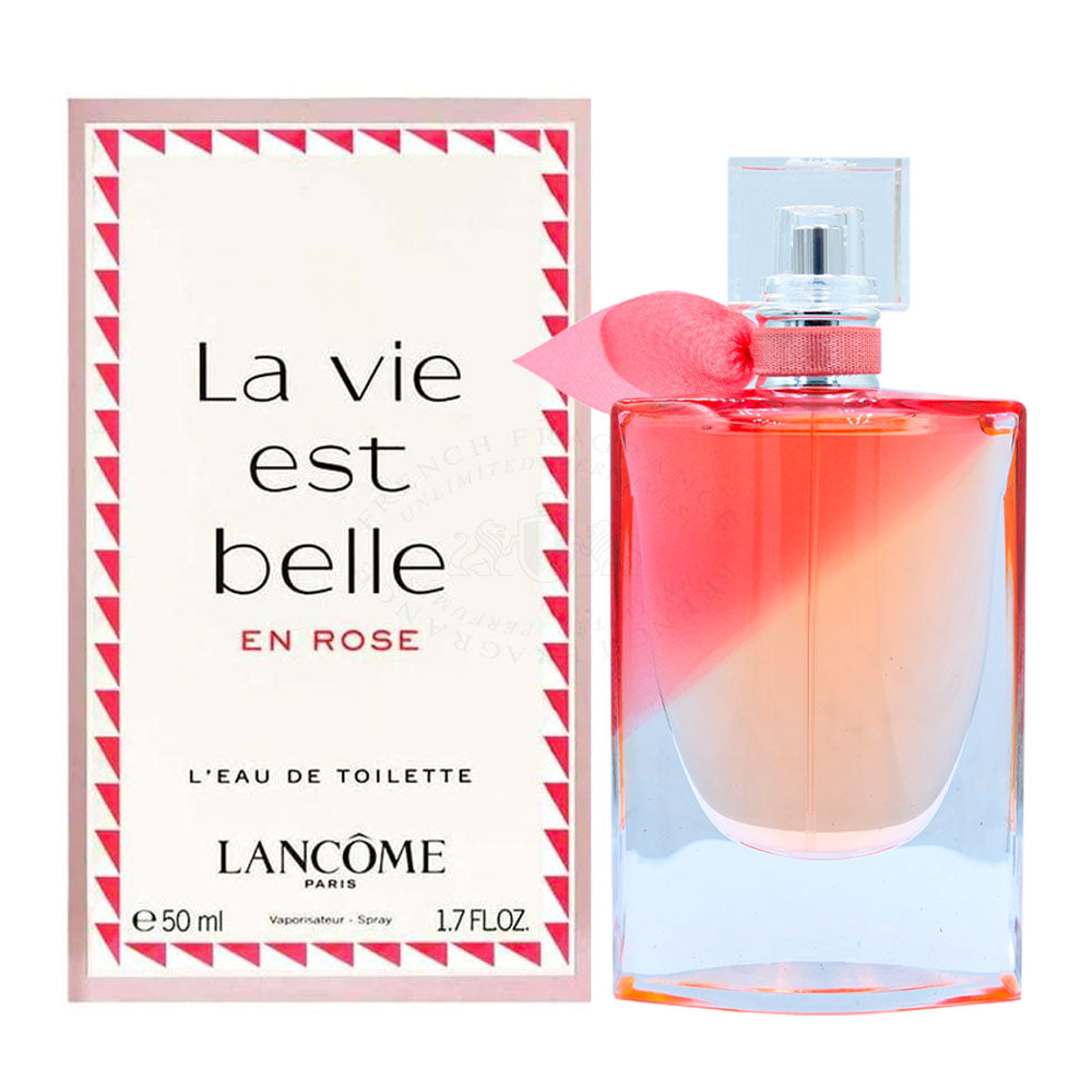 a bottle of perfume sitting next to a box