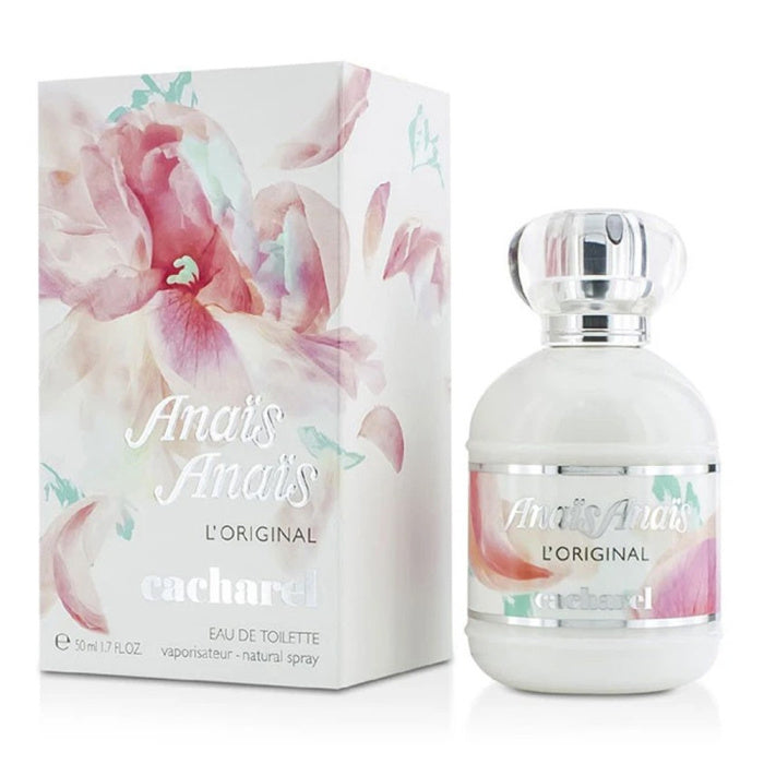 a bottle of perfume next to a box